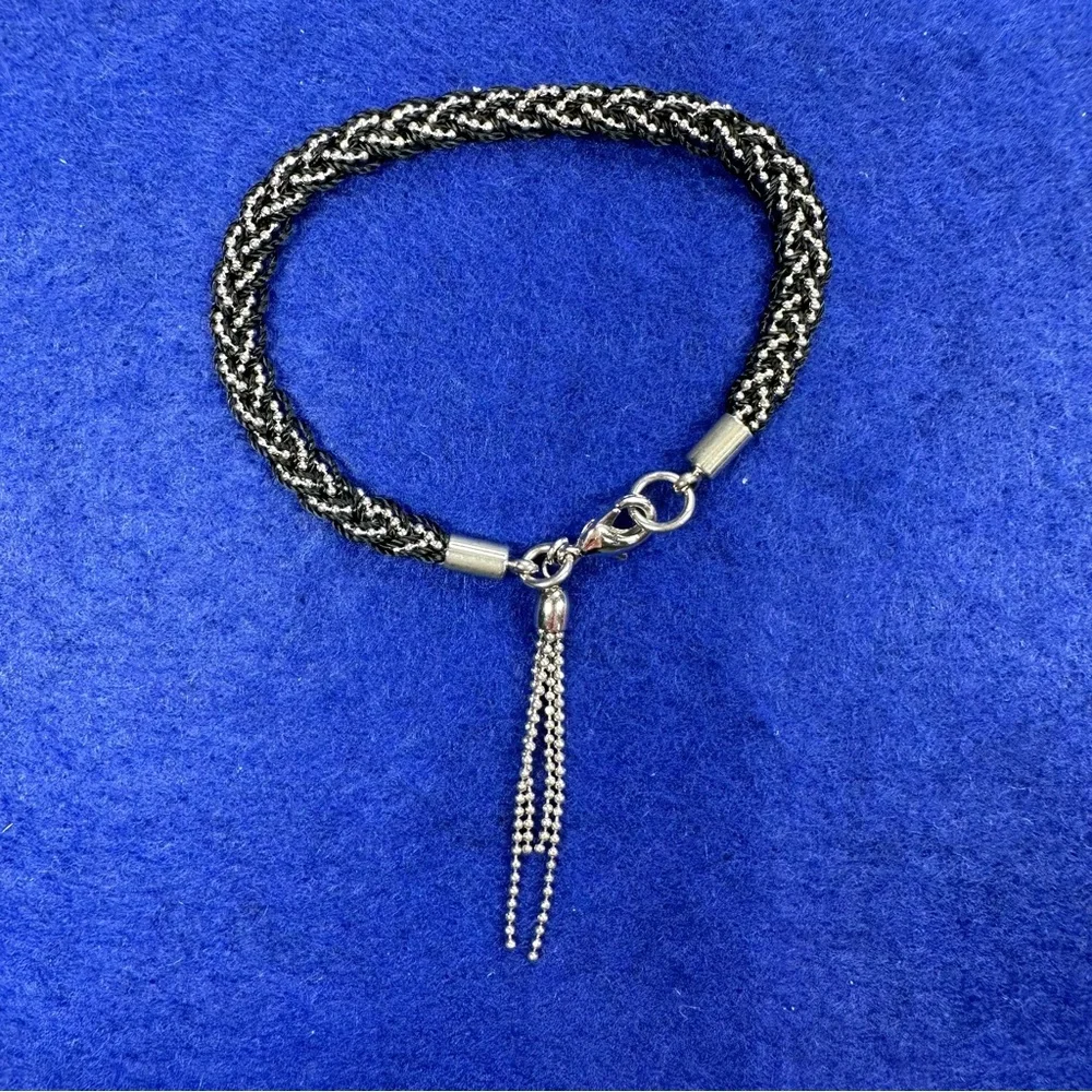 Boho Braided Silver tone and black bracelet with tassel.